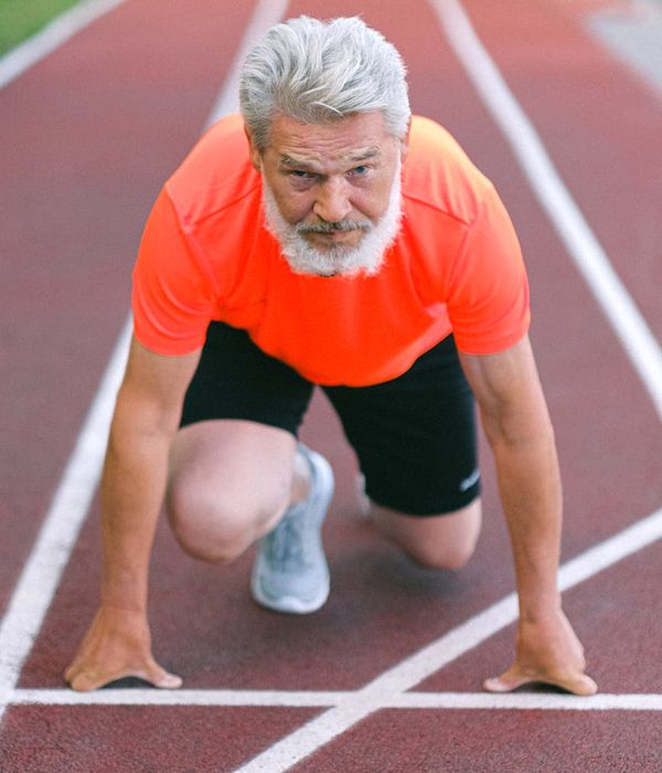 Man starting gentle strength exercises at home